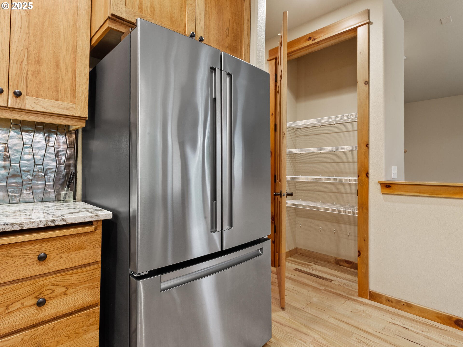 12800 Northeast Salmon Creek Avenue, Unit 119 Vancouver, WA 98686 - Photo 16 of 46 a kitchen with stainless steel appliances granite countertop a refrigerator and a cabinets