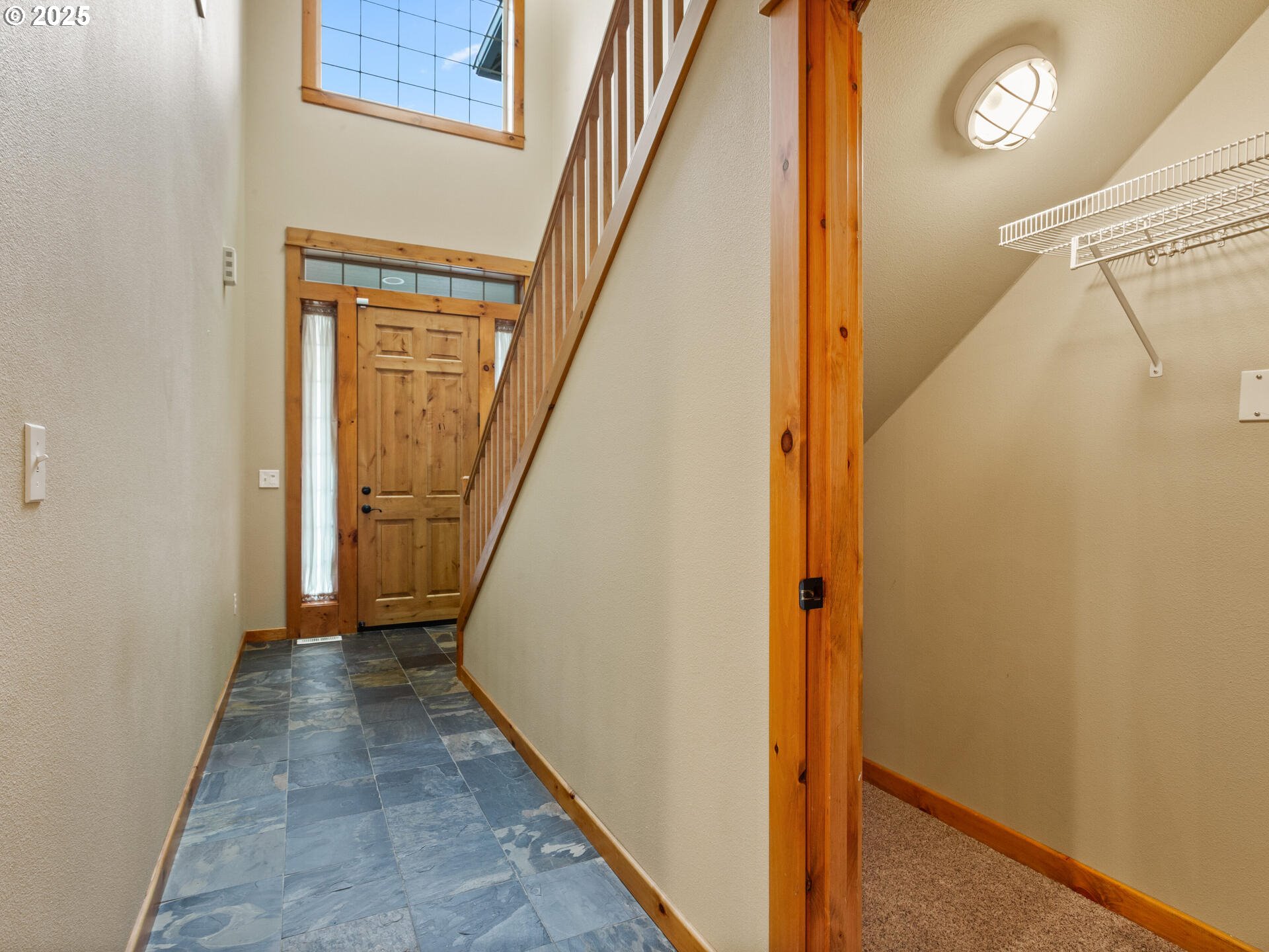 12800 Northeast Salmon Creek Avenue, Unit 119 Vancouver, WA 98686 - Photo 18 of 46 a view of a hallway with wooden floor and staircase
