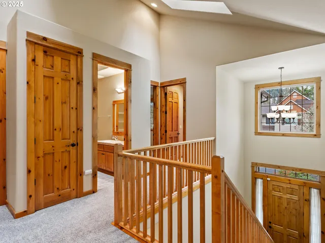 a view of a hallway with windows