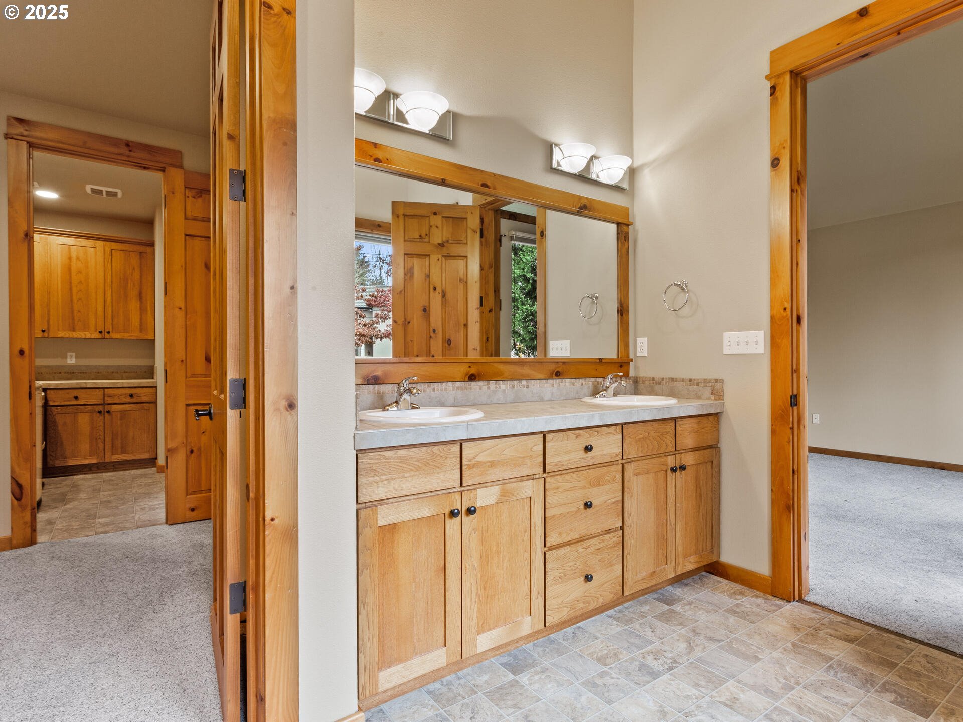 12800 Northeast Salmon Creek Avenue, Unit 119 Vancouver, WA 98686 - Photo 31 of 46 a bathroom with a sink and a mirror