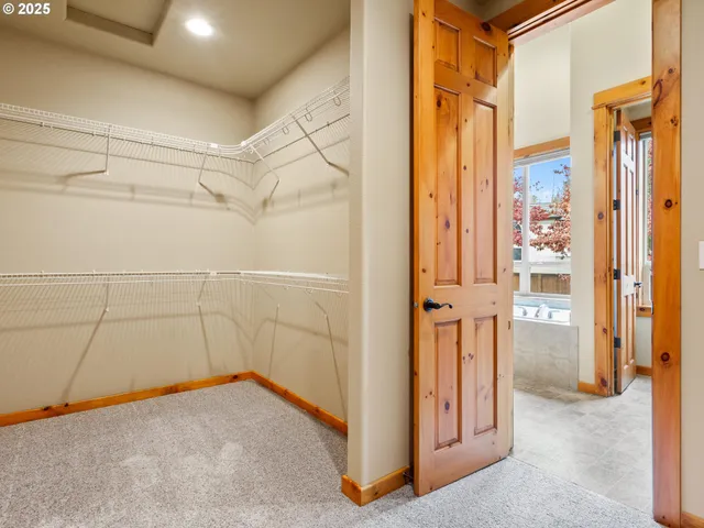 an empty room with closet area