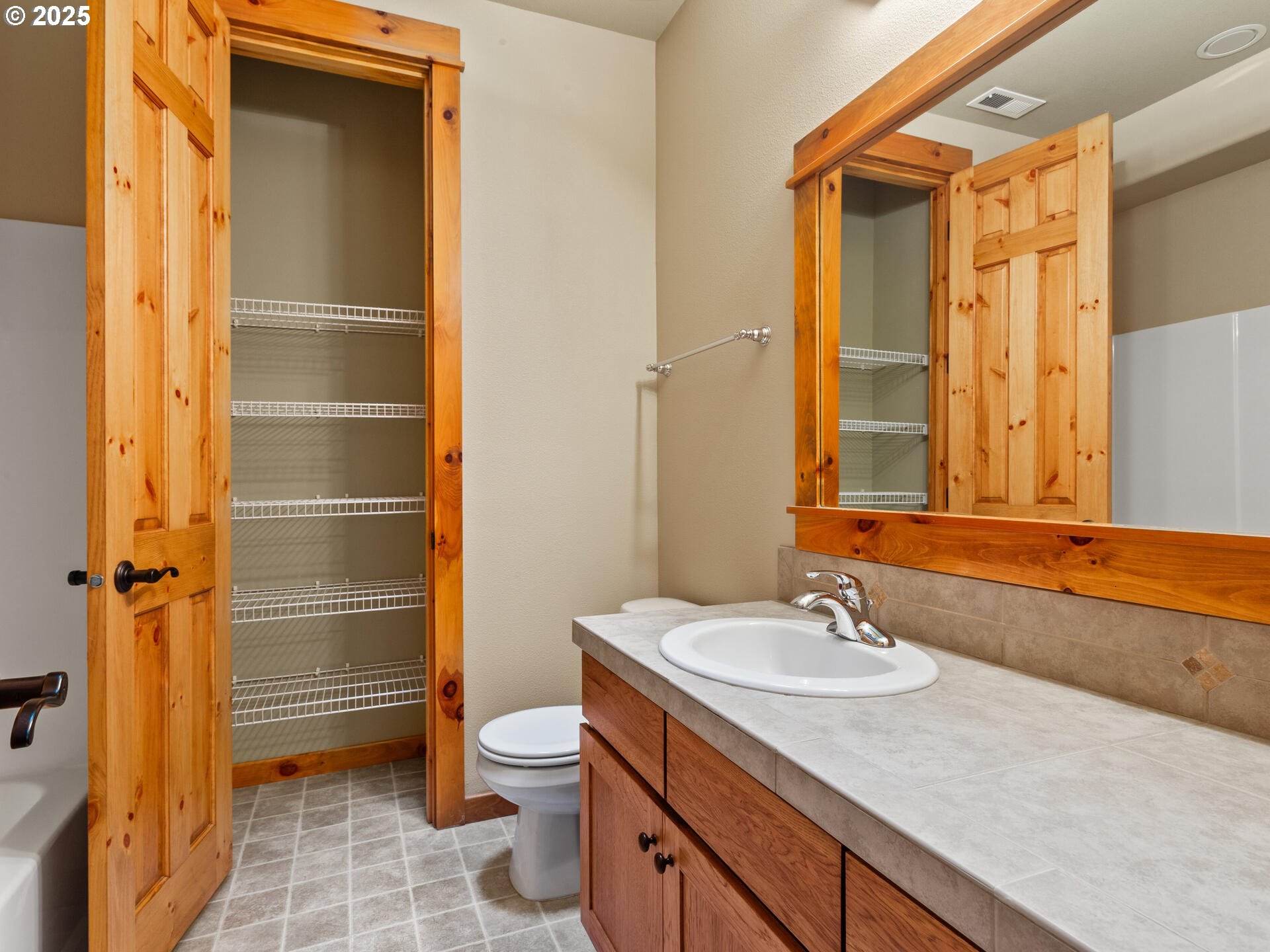 12800 Northeast Salmon Creek Avenue, Unit 119 Vancouver, WA 98686 - Photo 41 of 46 a bathroom with a sink a toilet and shower