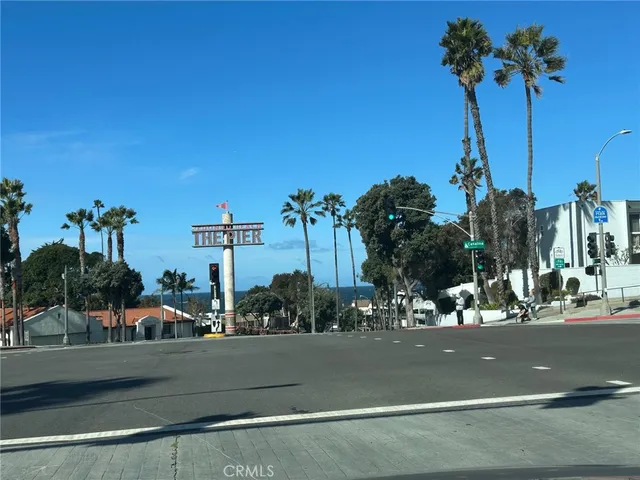 a view of a patio with couches and chairs