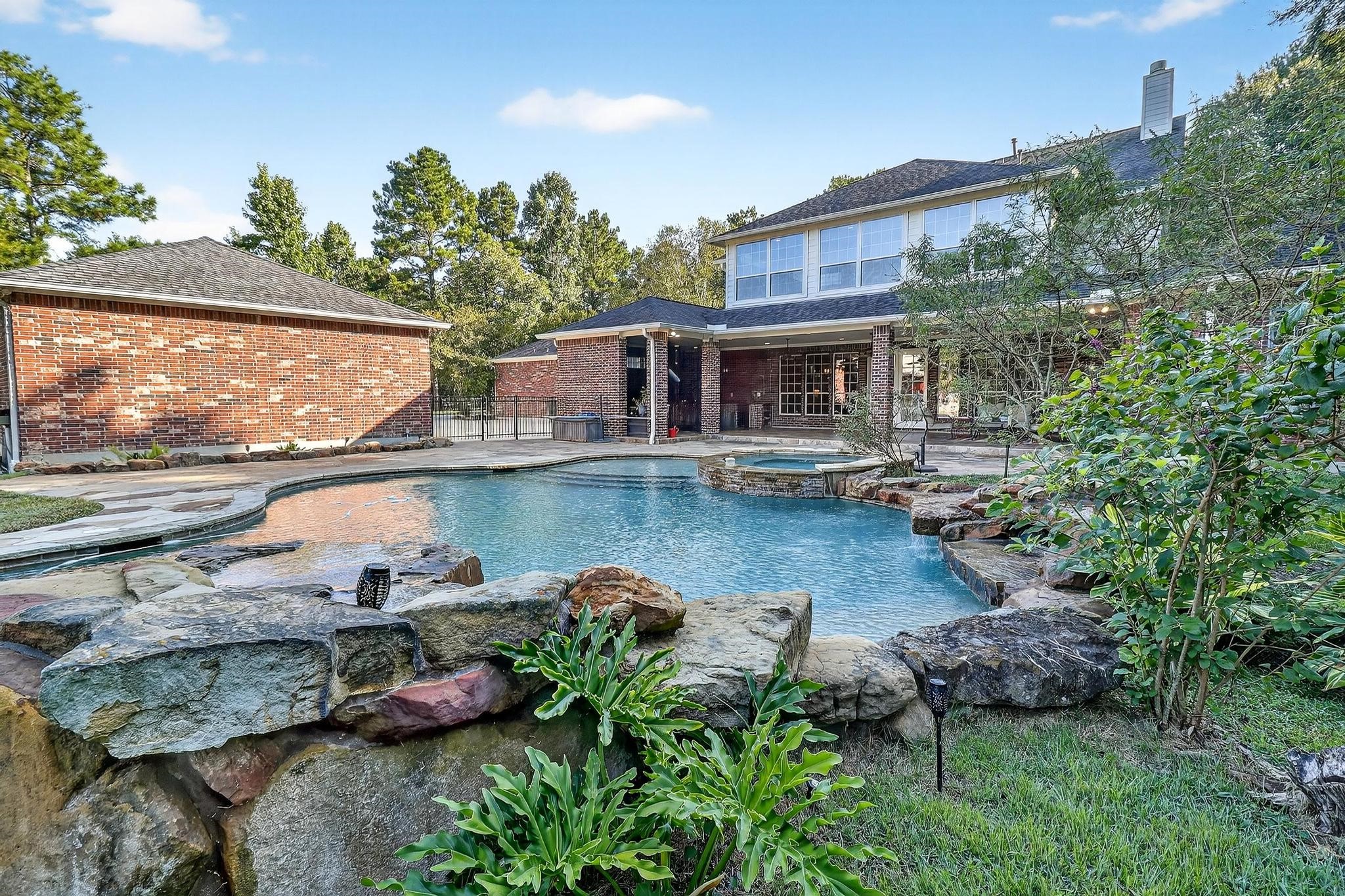 front view of a house with a garden