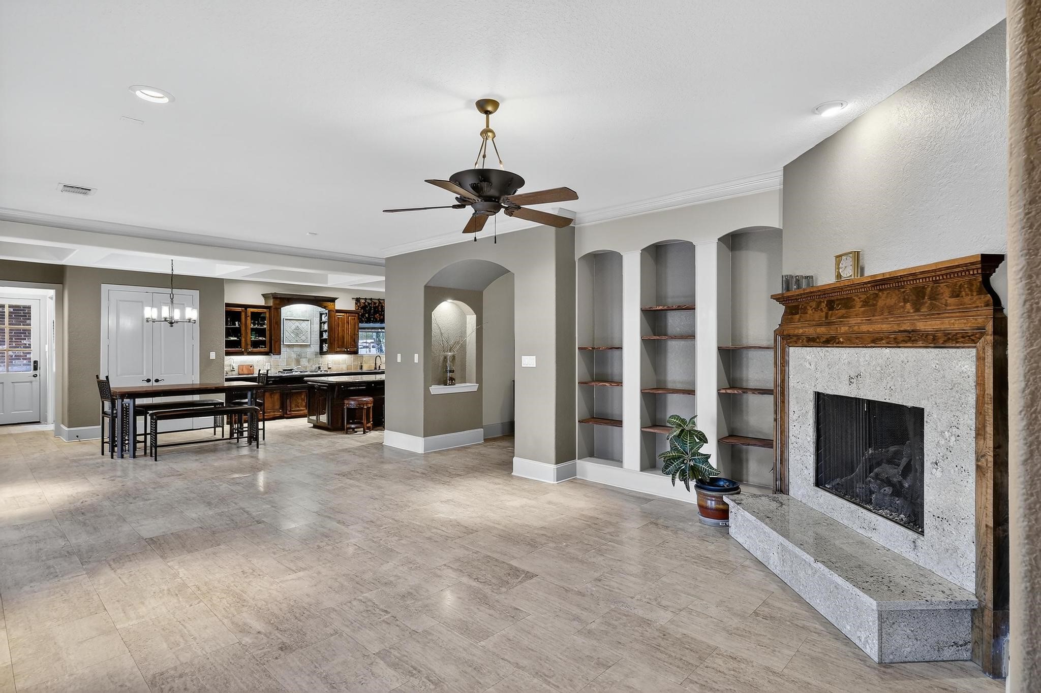 420 Whispering Meadow Magnolia, TX 77355 - Photo 11 of 44 a view of a livingroom with furniture and a fireplace