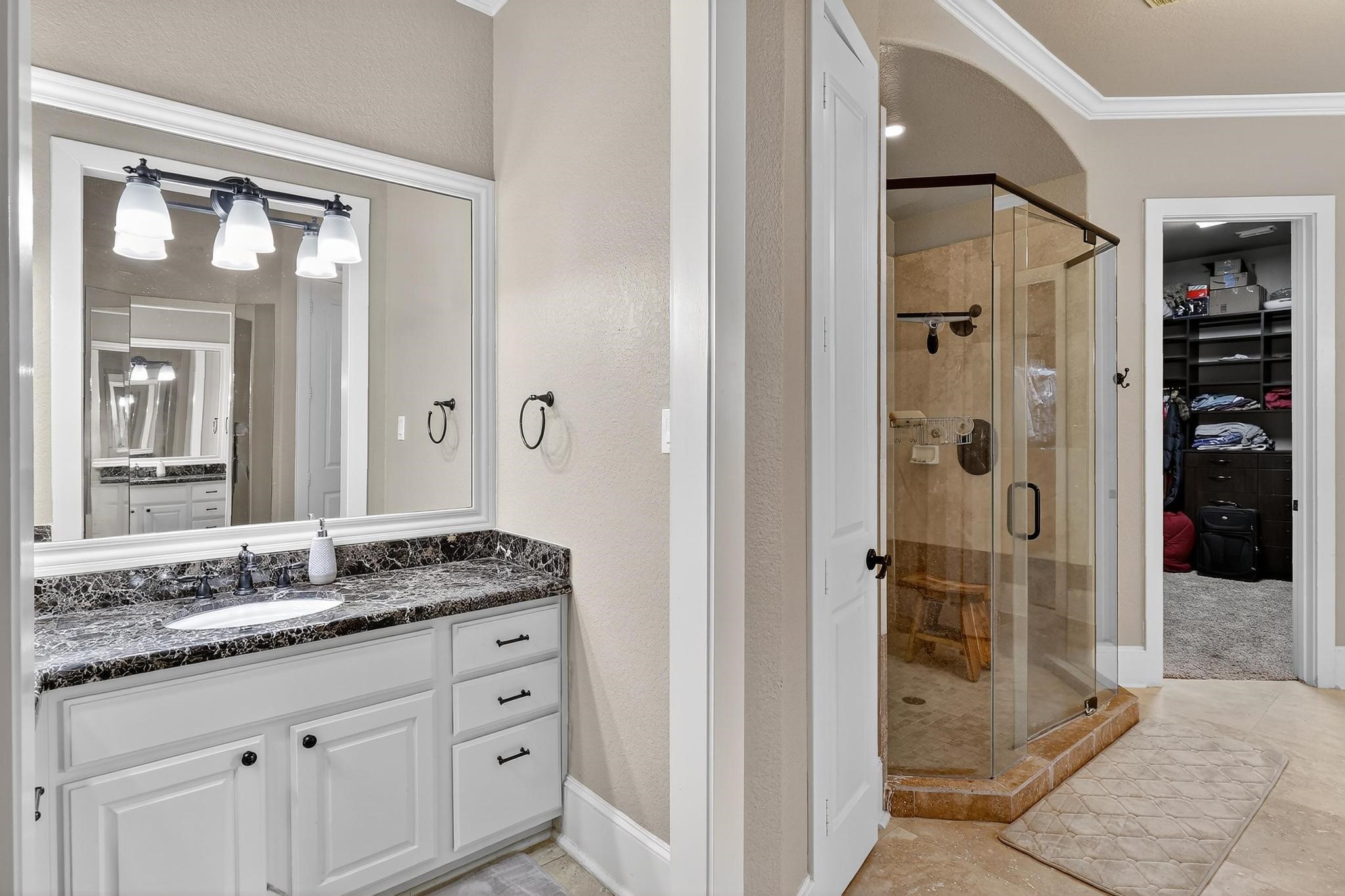 420 Whispering Meadow Magnolia, TX 77355 - Photo 13 of 44 a bathroom with a granite countertop sink and a mirror