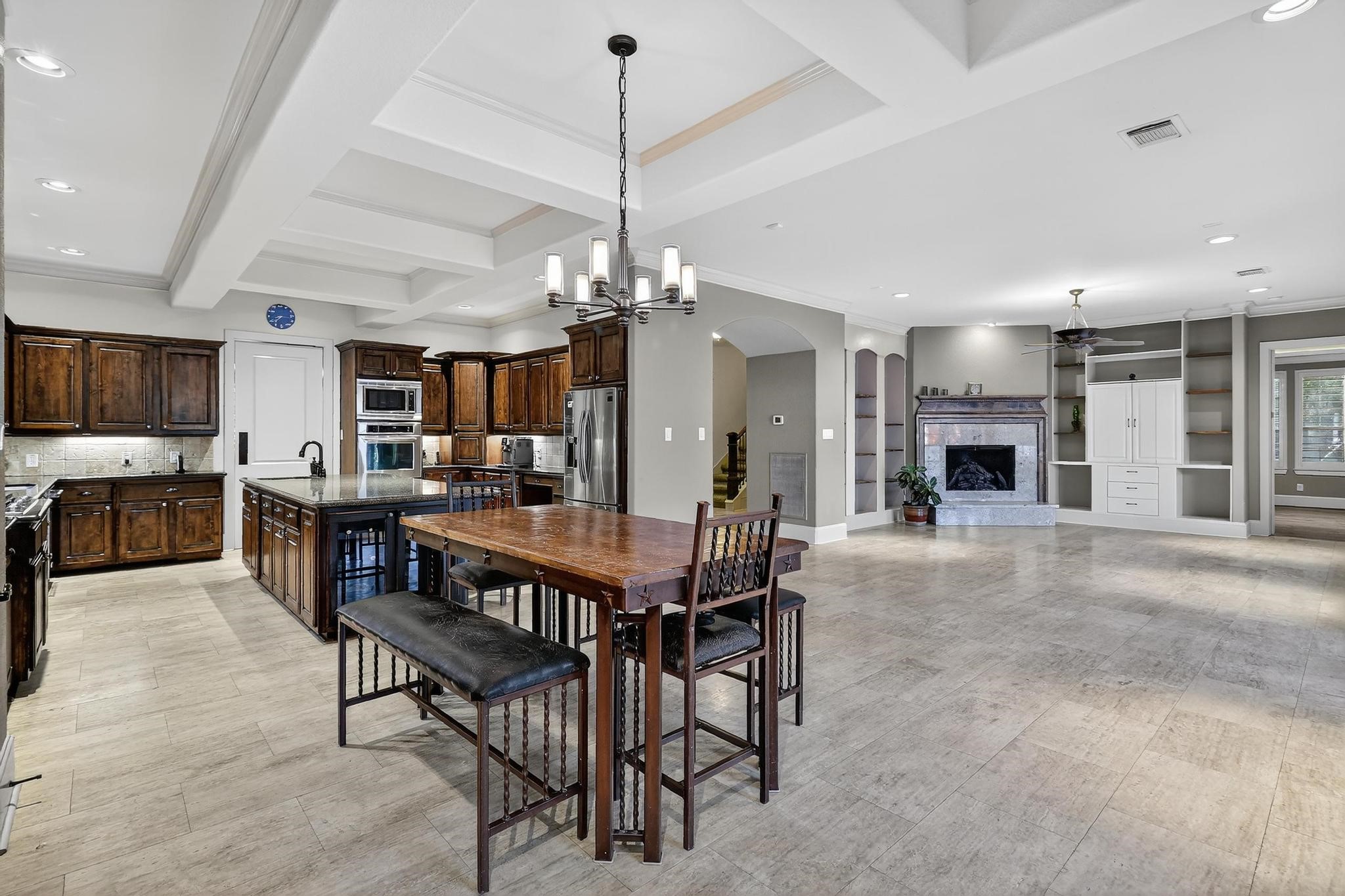 420 Whispering Meadow Magnolia, TX 77355 - Photo 15 of 44 a view of a dining room with furniture and chandelier