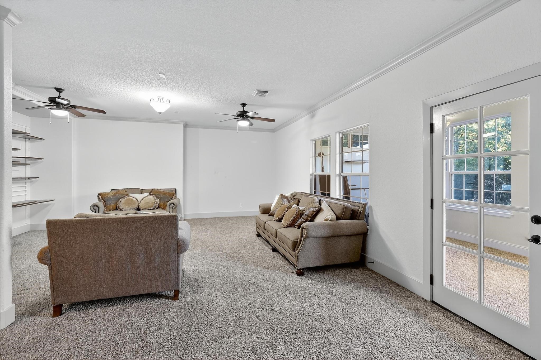 420 Whispering Meadow Magnolia, TX 77355 - Photo 22 of 44 a living room with furniture and a window