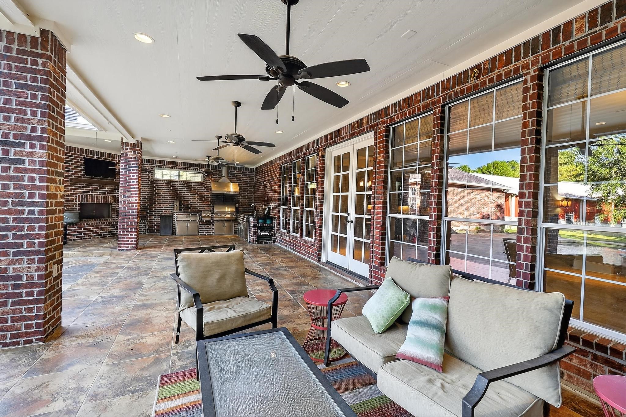 420 Whispering Meadow Magnolia, TX 77355 - Photo 36 of 44 a living room with furniture and a large window