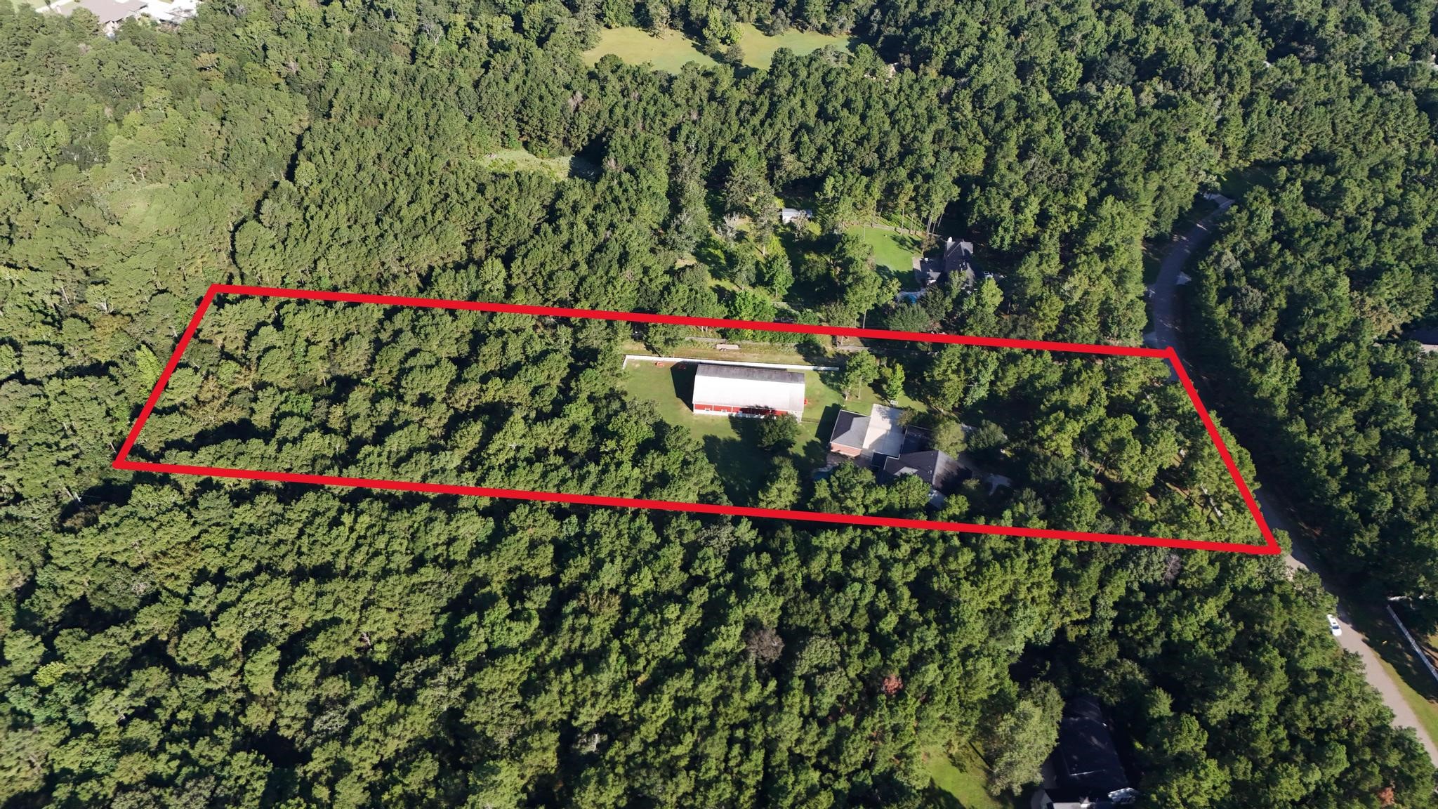 420 Whispering Meadow Magnolia, TX 77355 - Photo 44 of 44 a view of a flower garden in front of a house