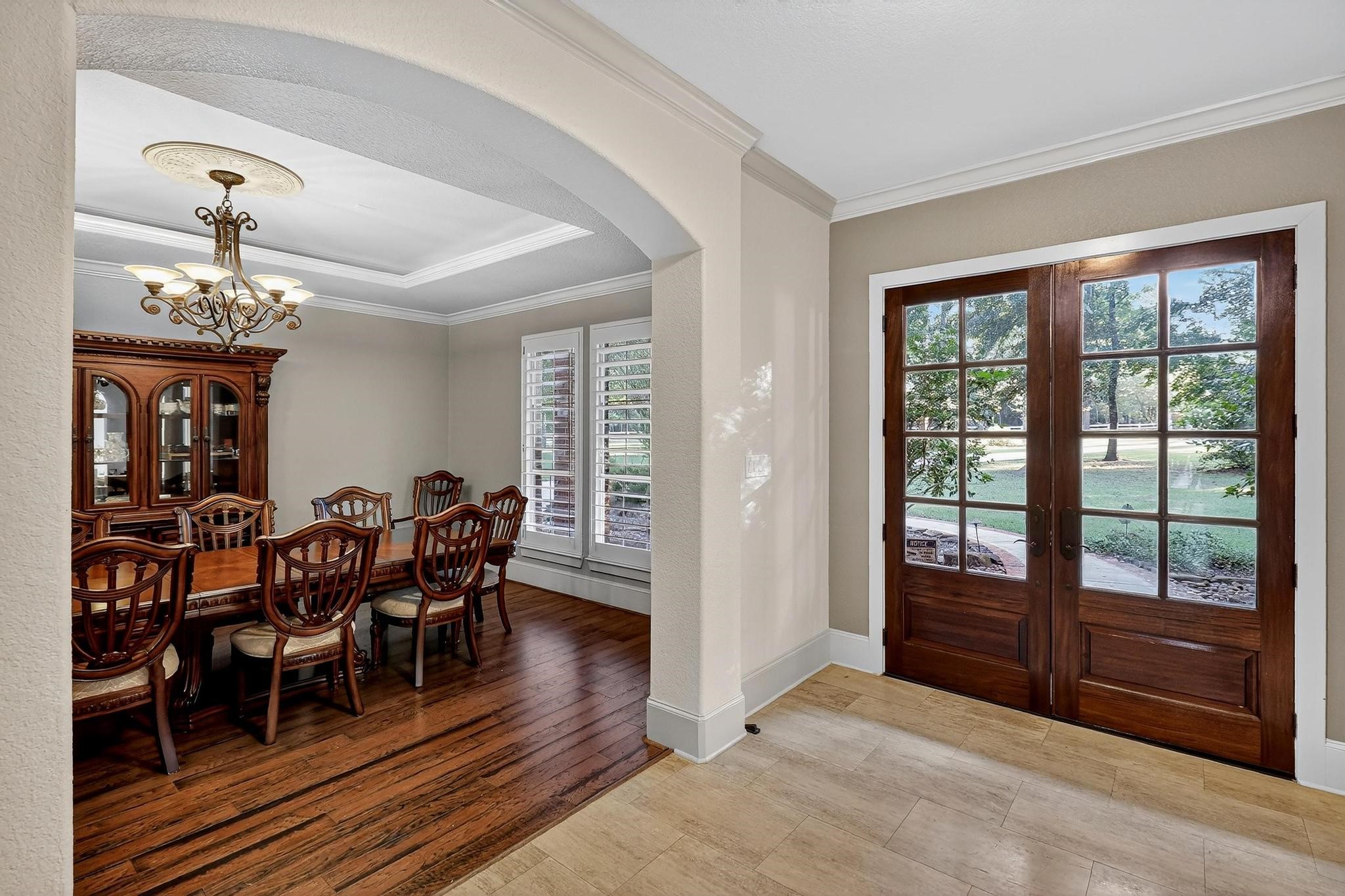 420 Whispering Meadow Magnolia, TX 77355 - Photo 6 of 44 a view of a dining room with furniture window and wooden floor