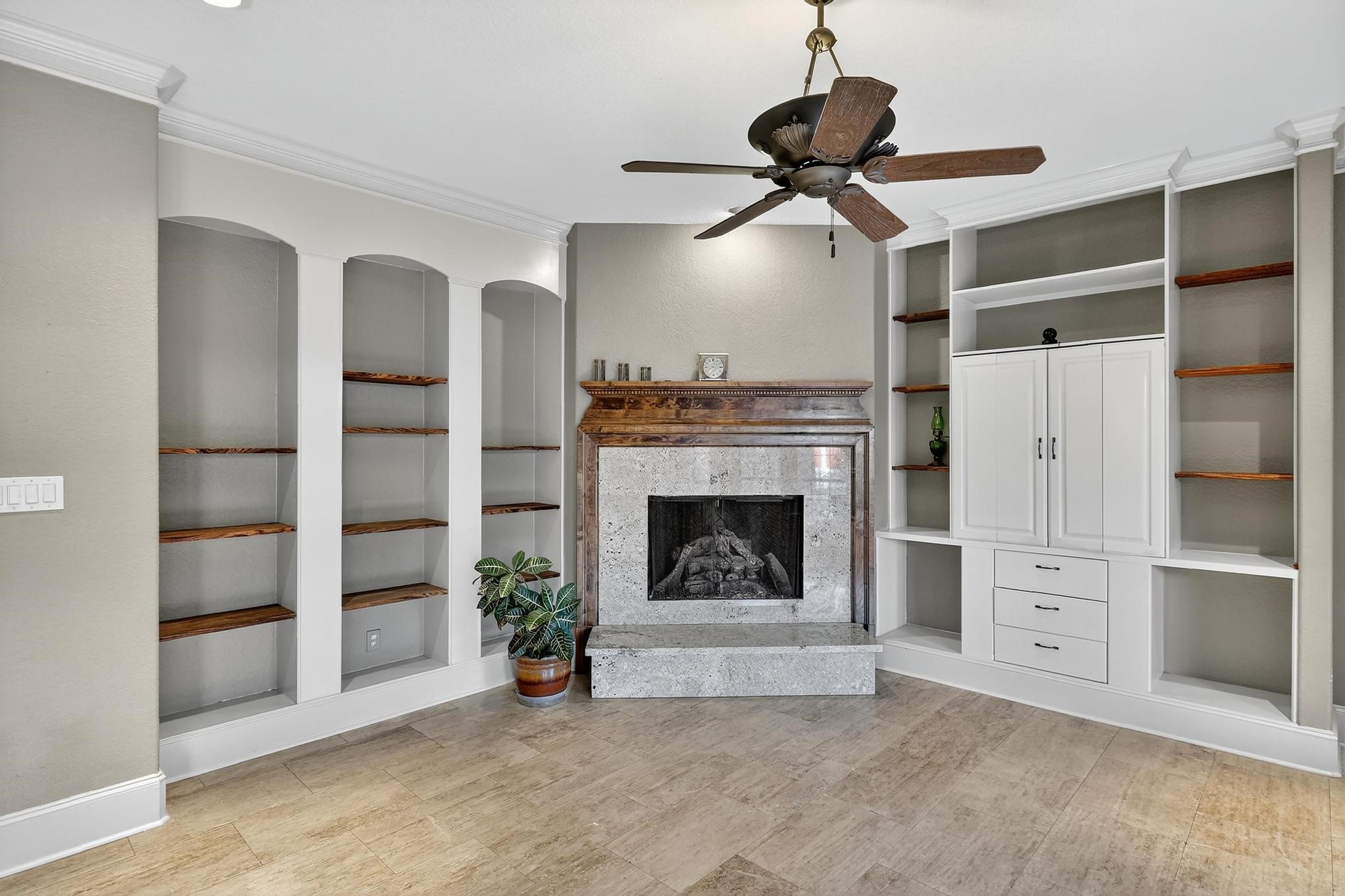 420 Whispering Meadow Magnolia, TX 77355 - Photo 10 of 44 a view of a livingroom with a fireplace and cabinet