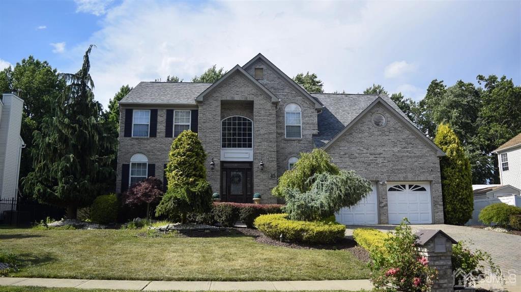 45 Stratton Road Old Bridge, NJ 07747 - Photo 1 of 19 front view of a house with a yard