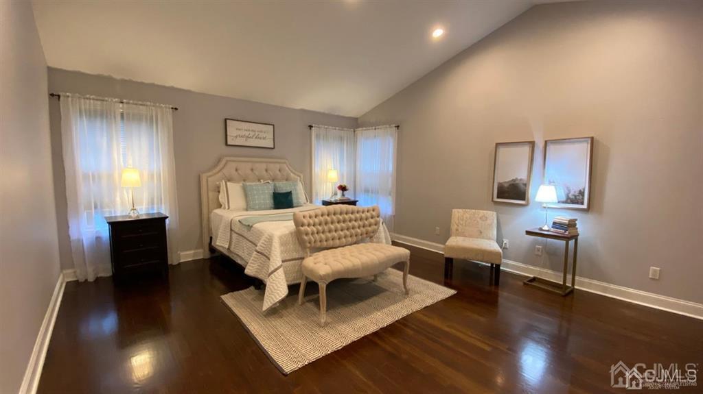45 Stratton Road Old Bridge, NJ 07747 - Photo 13 of 19 a bedroom with a bed and wooden floor