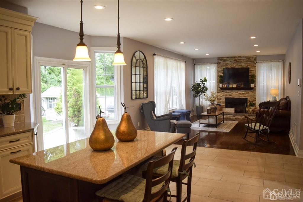45 Stratton Road Old Bridge, NJ 07747 - Photo 6 of 19 a living room with furniture a window and a chandelier