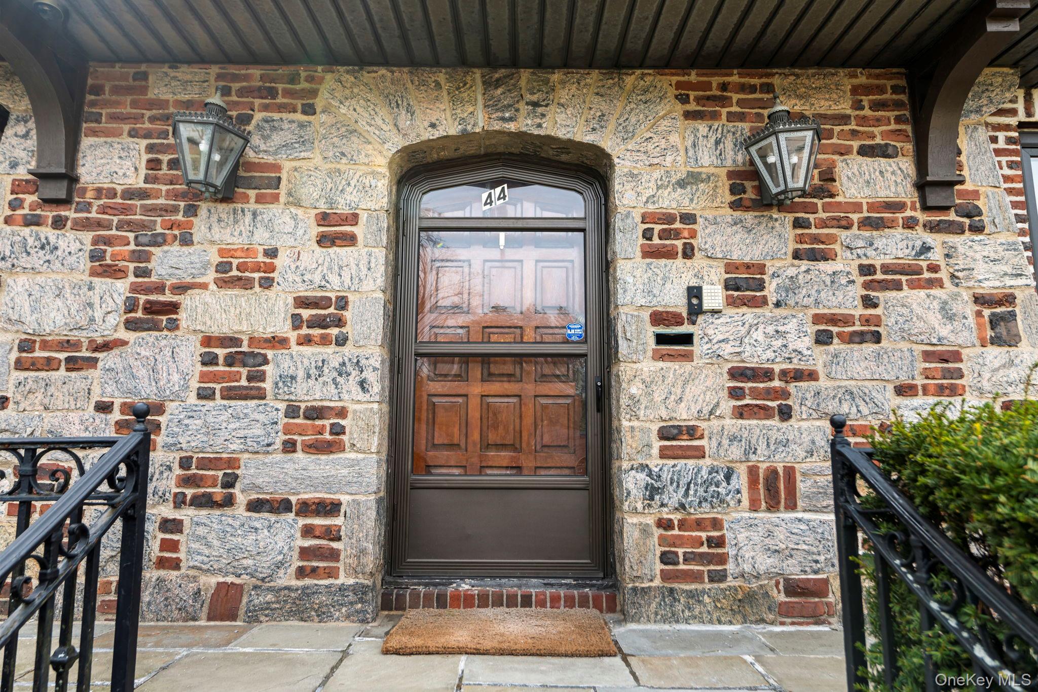 44 Fenimore Road New Rochelle, NY 10804 - Photo 3 of 46 a building with glass door
