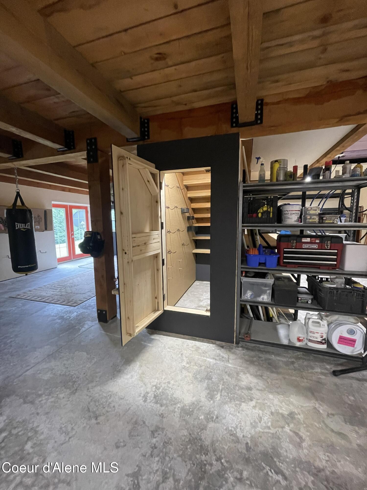 53 Sawtooth Way Sagle, ID 83860 - Photo 49 of 71 Hidden Storage Under the Stairs Open
