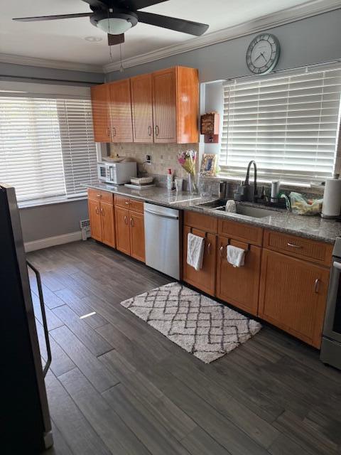 5409 Buchanan Road Delray Beach, FL 33484 - Photo 12 of 25 a kitchen with stainless steel appliances granite countertop a sink a stove a counter space and cabinets