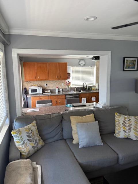 5409 Buchanan Road Delray Beach, FL 33484 - Photo 3 of 25 a living room with furniture and a large window