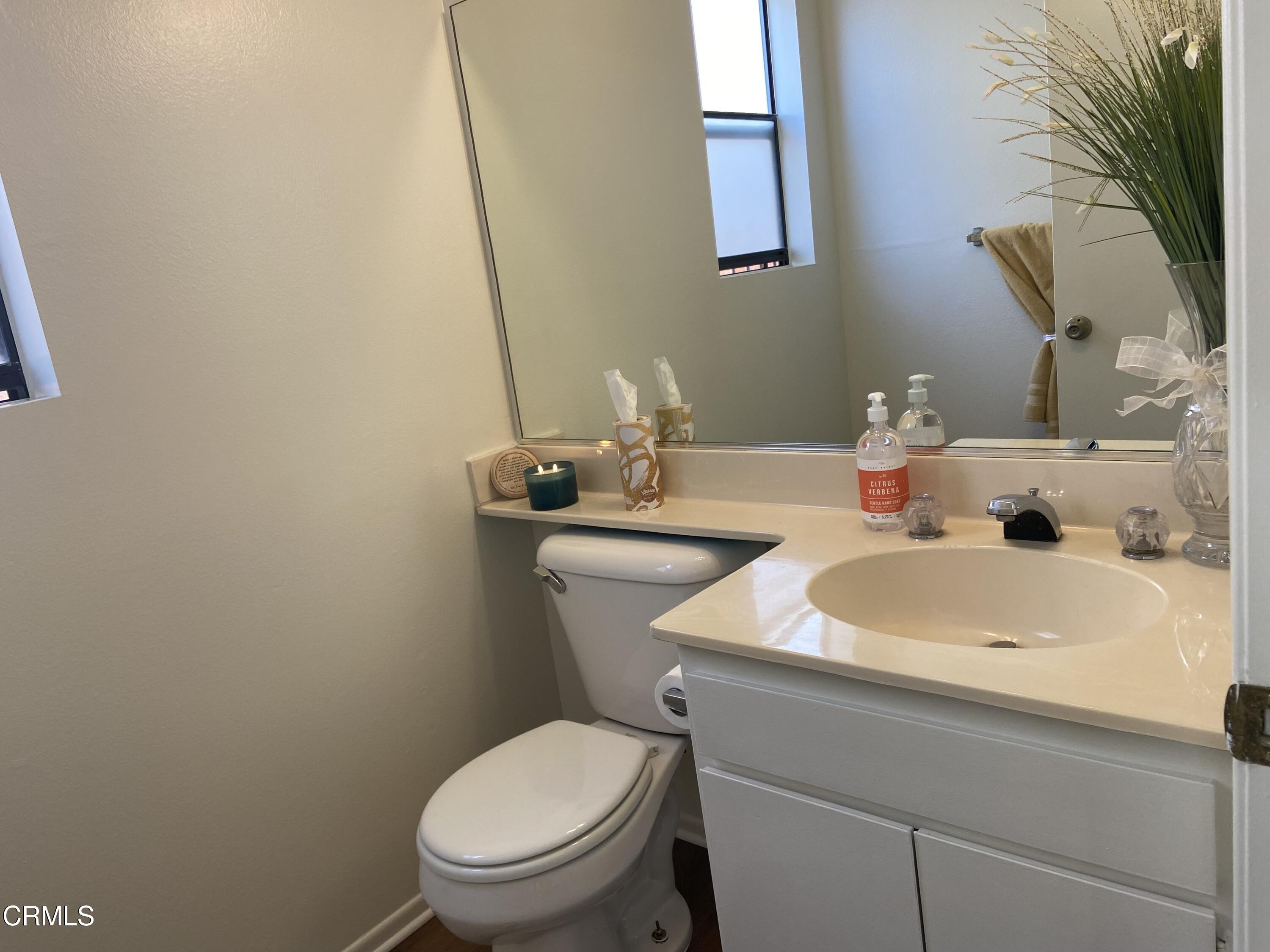 4465 Pine Ridge Court Moorpark, CA 93021 - Photo 20 of 22 a bathroom with a sink and a toilet