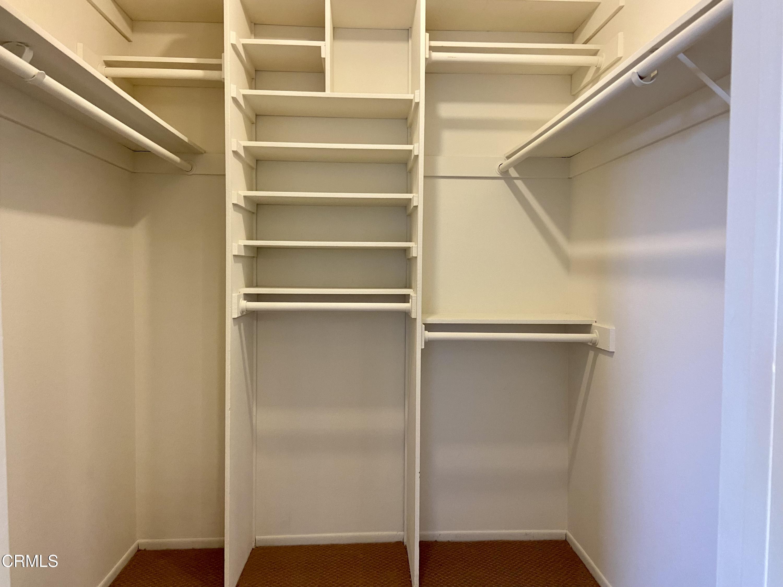 4465 Pine Ridge Court Moorpark, CA 93021 - Photo 8 of 22 a view of walk in closet with empty racks