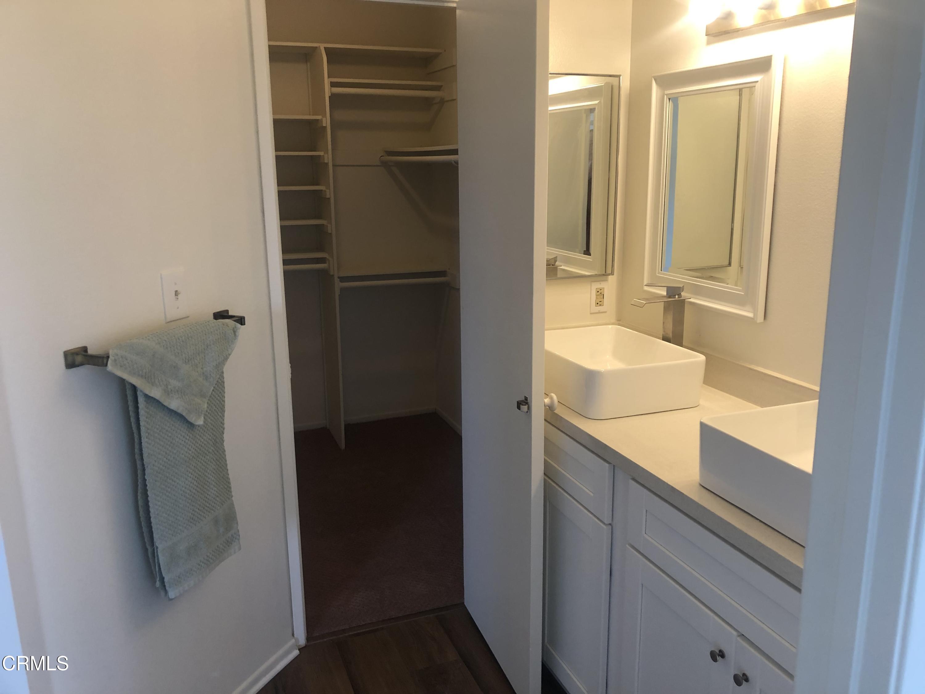 4465 Pine Ridge Court Moorpark, CA 93021 - Photo 10 of 22 a bathroom with a sink and a mirror