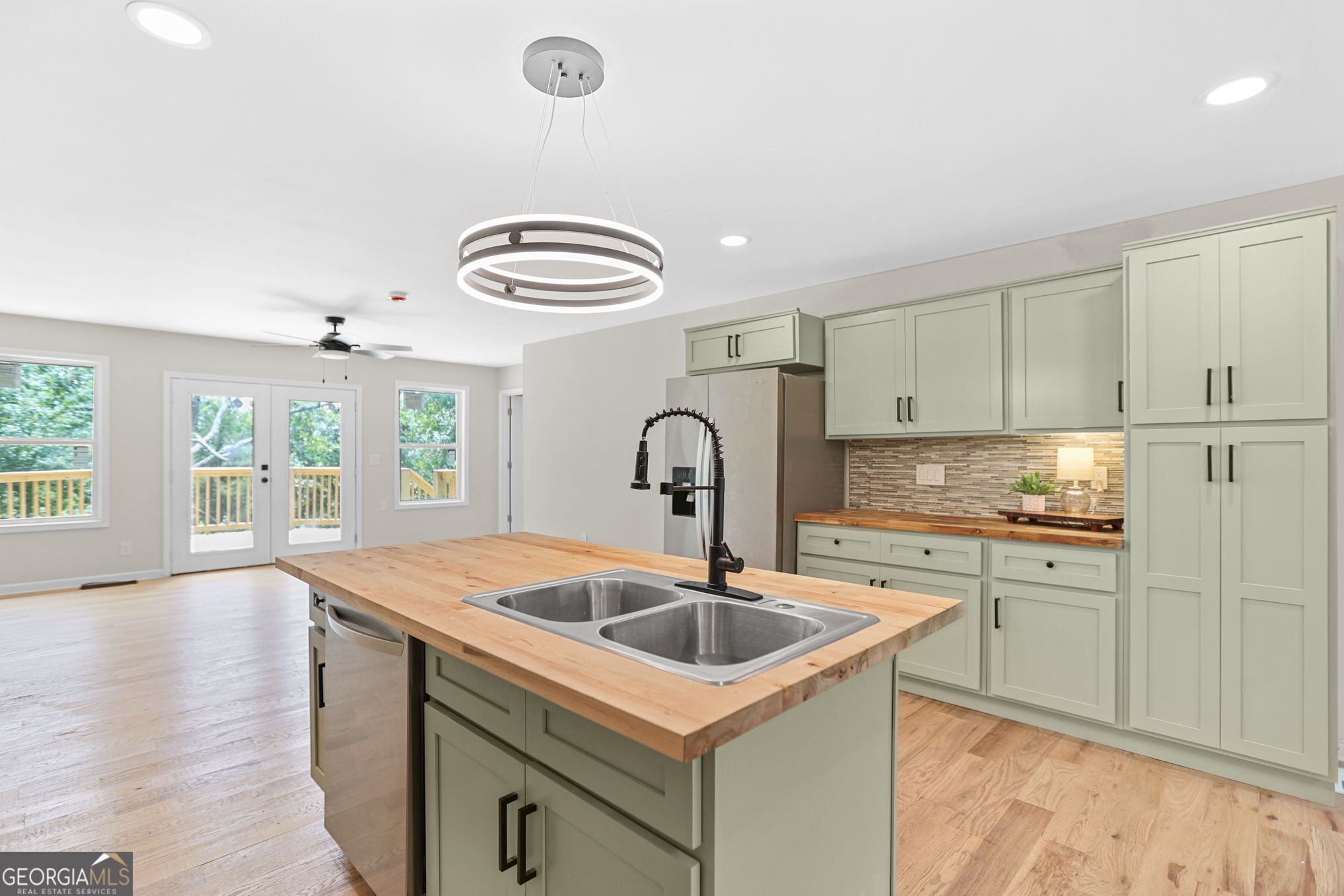 7060 Scenic Heights Road Manchester, GA 31816 - Photo 17 of 52 a kitchen with a sink cabinets and window