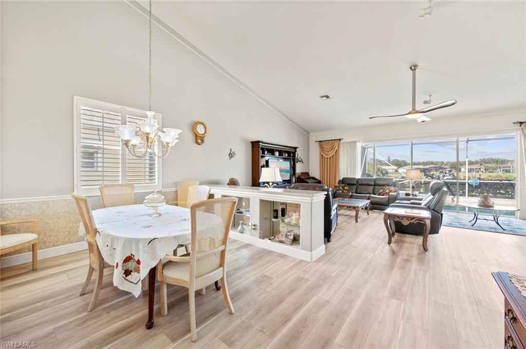 20810 Rivers Ford Estero, FL 33928 - Photo 12 of 49 a dining room with furniture and wooden floor