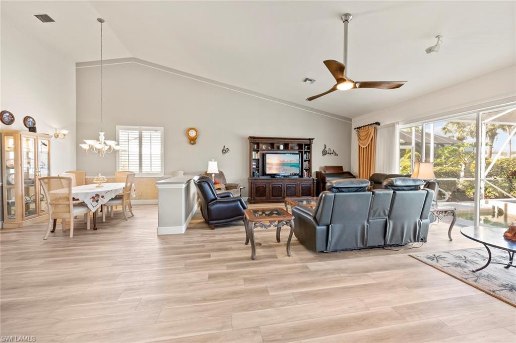 20810 Rivers Ford Estero, FL 33928 - Photo 14 of 49 a living room with furniture and a large window