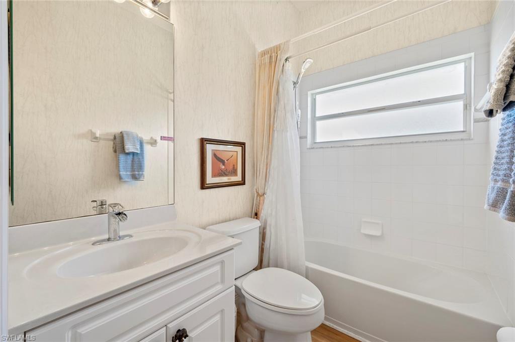20810 Rivers Ford Estero, FL 33928 - Photo 32 of 49 a bathroom with a sink toilet and shower