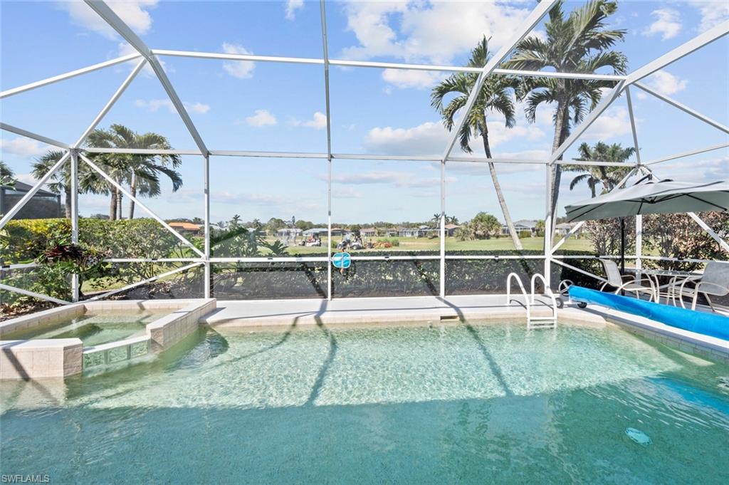 20810 Rivers Ford Estero, FL 33928 - Photo 36 of 49 a view of a swimming pool with a patio