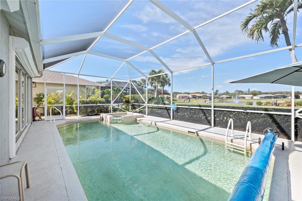 20810 Rivers Ford Estero, FL 33928 - Photo 38 of 49 a view of a swimming pool with a patio