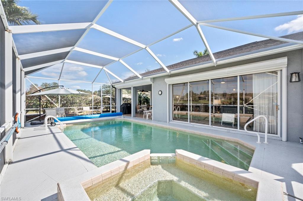 20810 Rivers Ford Estero, FL 33928 - Photo 39 of 49 a view of a swimming pool with a patio
