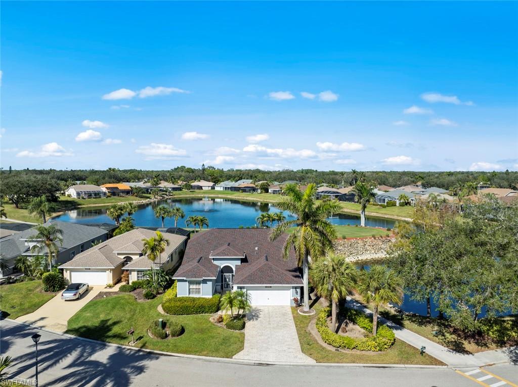 20810 Rivers Ford Estero, FL 33928 - Photo 4 of 49 a view of a lake with a yard