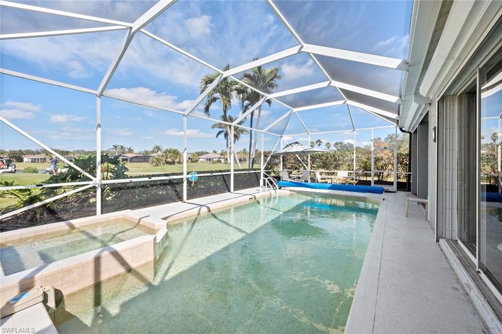 20810 Rivers Ford Estero, FL 33928 - Photo 7 of 49 a view of a swimming pool with a patio
