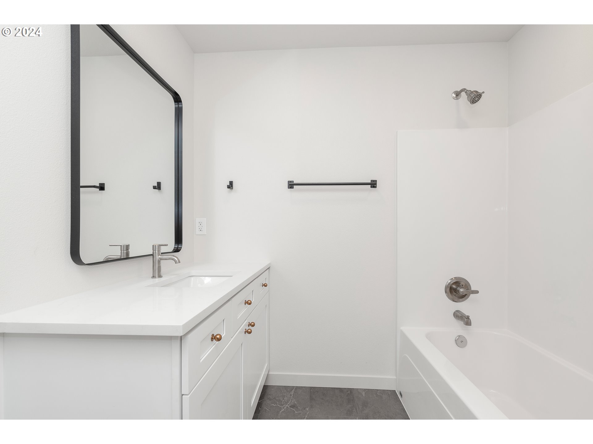 3004 Orange Road Winlock, WA 98596 - Photo 30 of 35 a bathroom with a tub sink and mirror