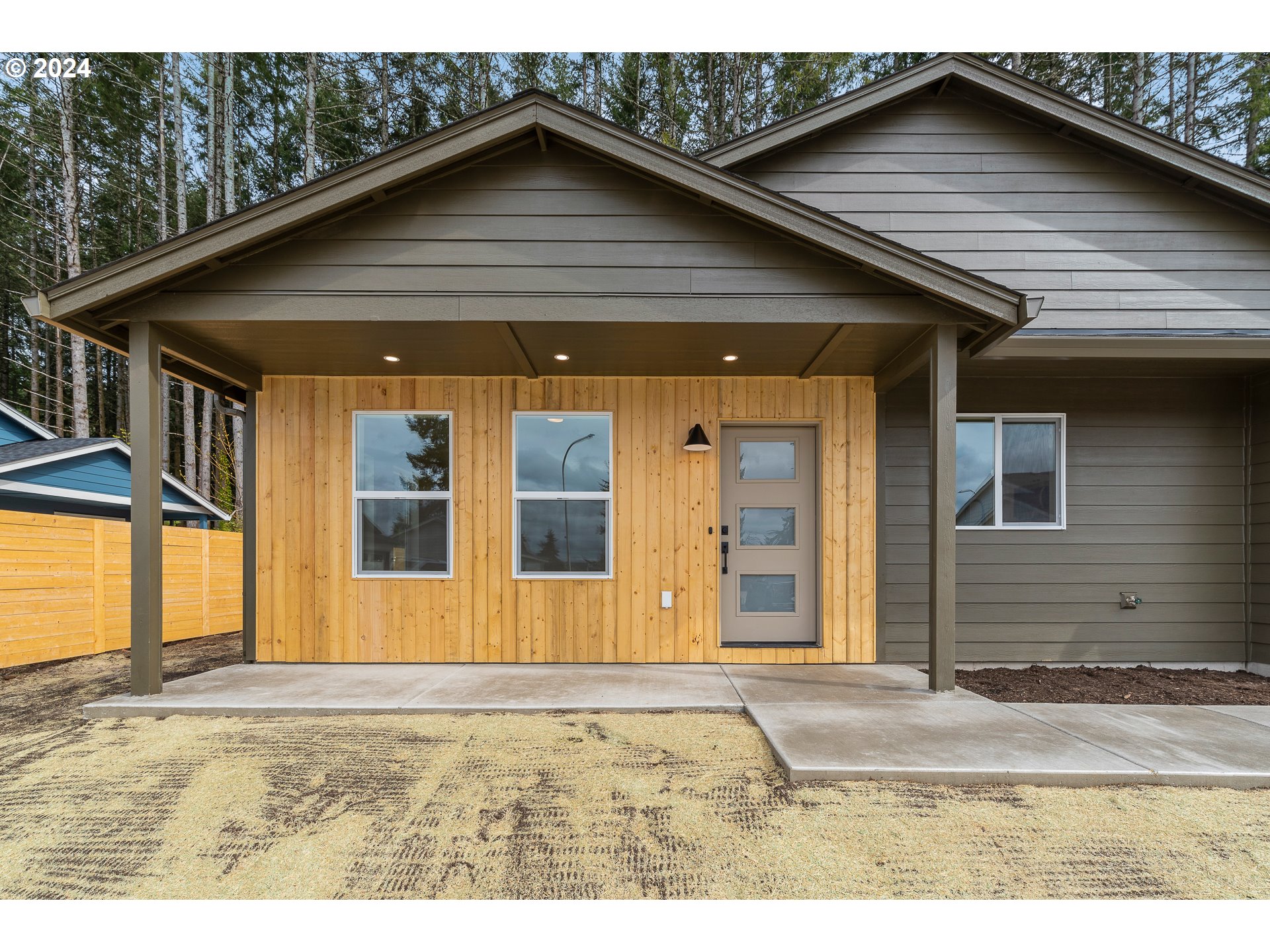 3004 Orange Road Winlock, WA 98596 - Photo 3 of 35 a house with trees in the background