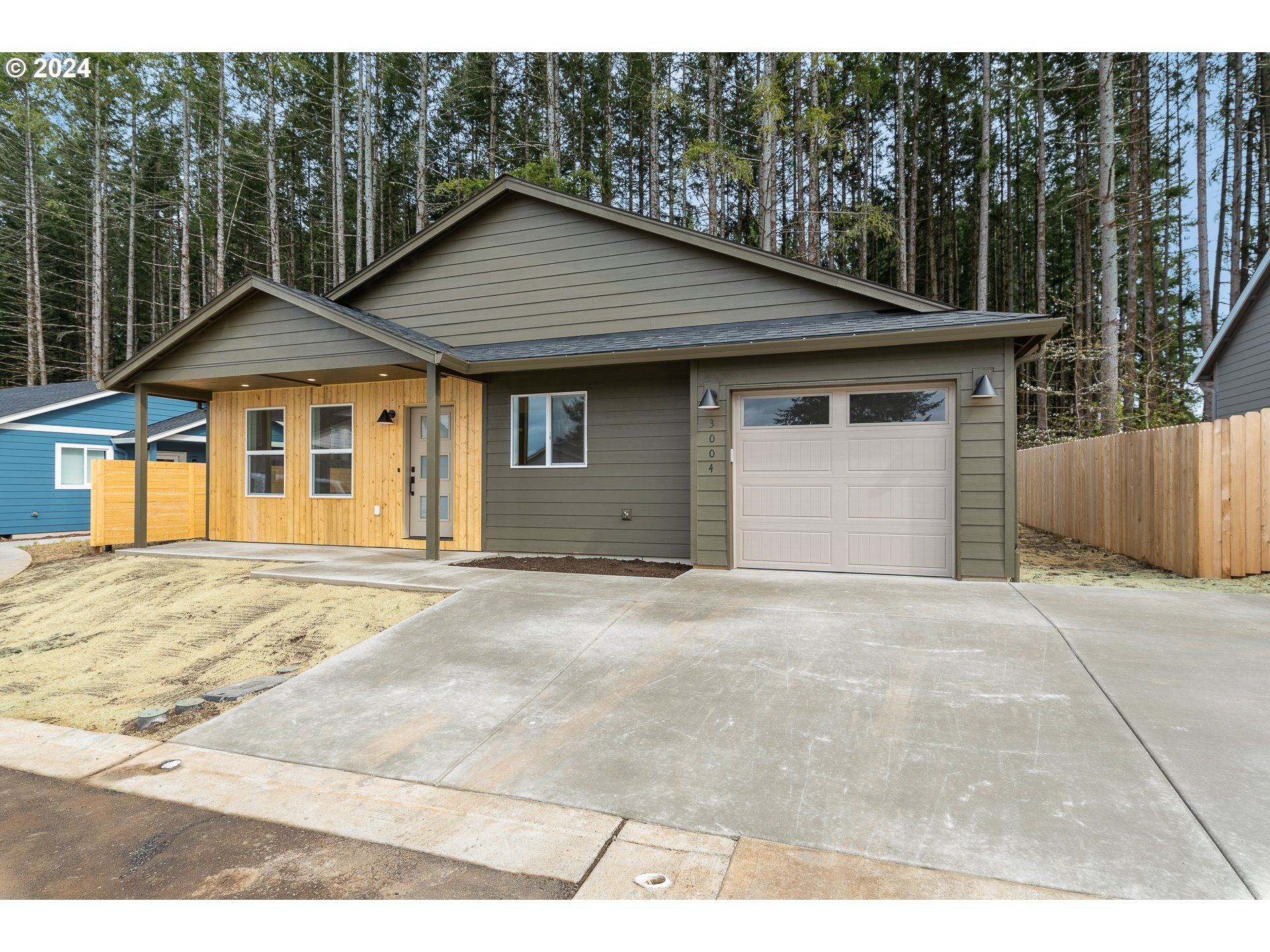 3004 Orange Road Winlock, WA 98596 - Photo 31 of 35 a house with trees in the background