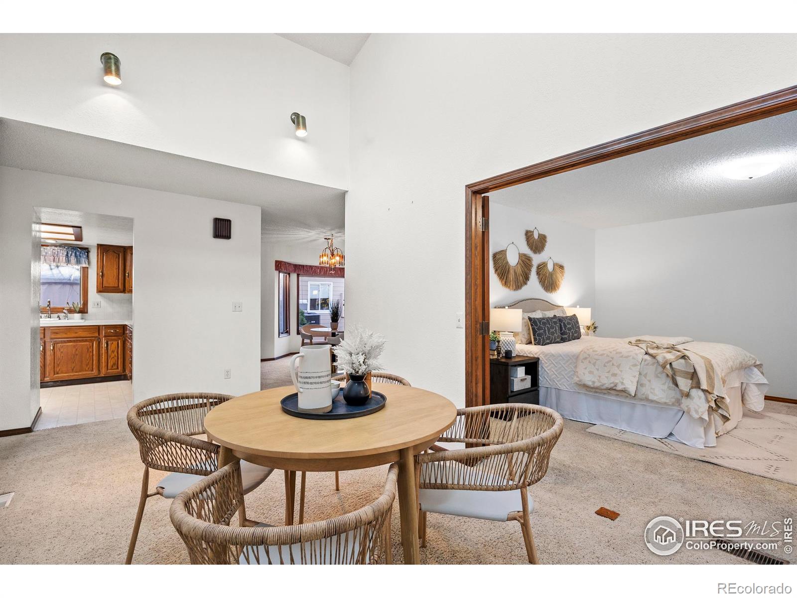 903 Conifer Court Windsor, CO 80550 - Photo 8 of 33 a living room with furniture and a table