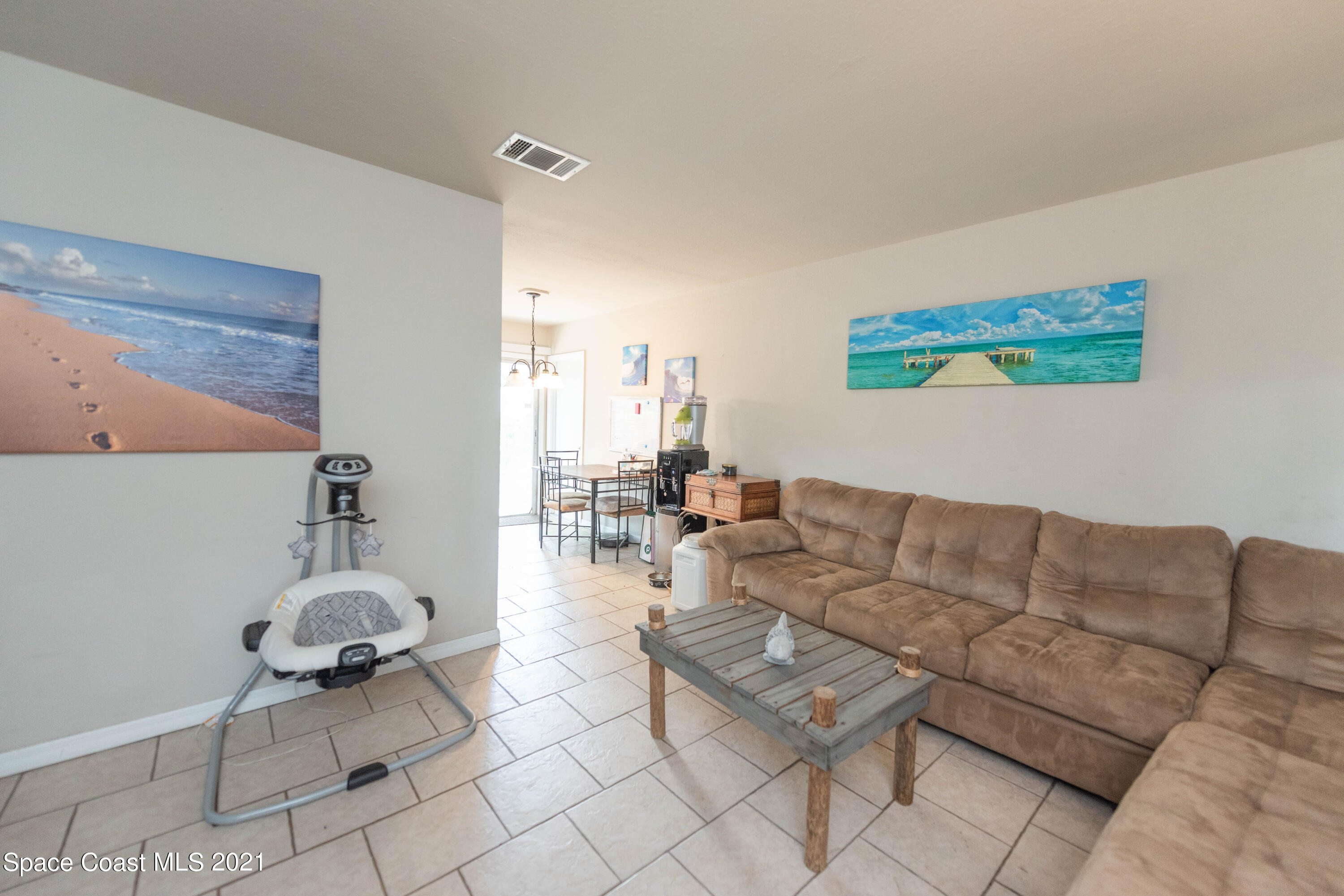 237 Chase Road Cocoa, FL 32927 - Photo 4 of 20 a living room with furniture and a couch