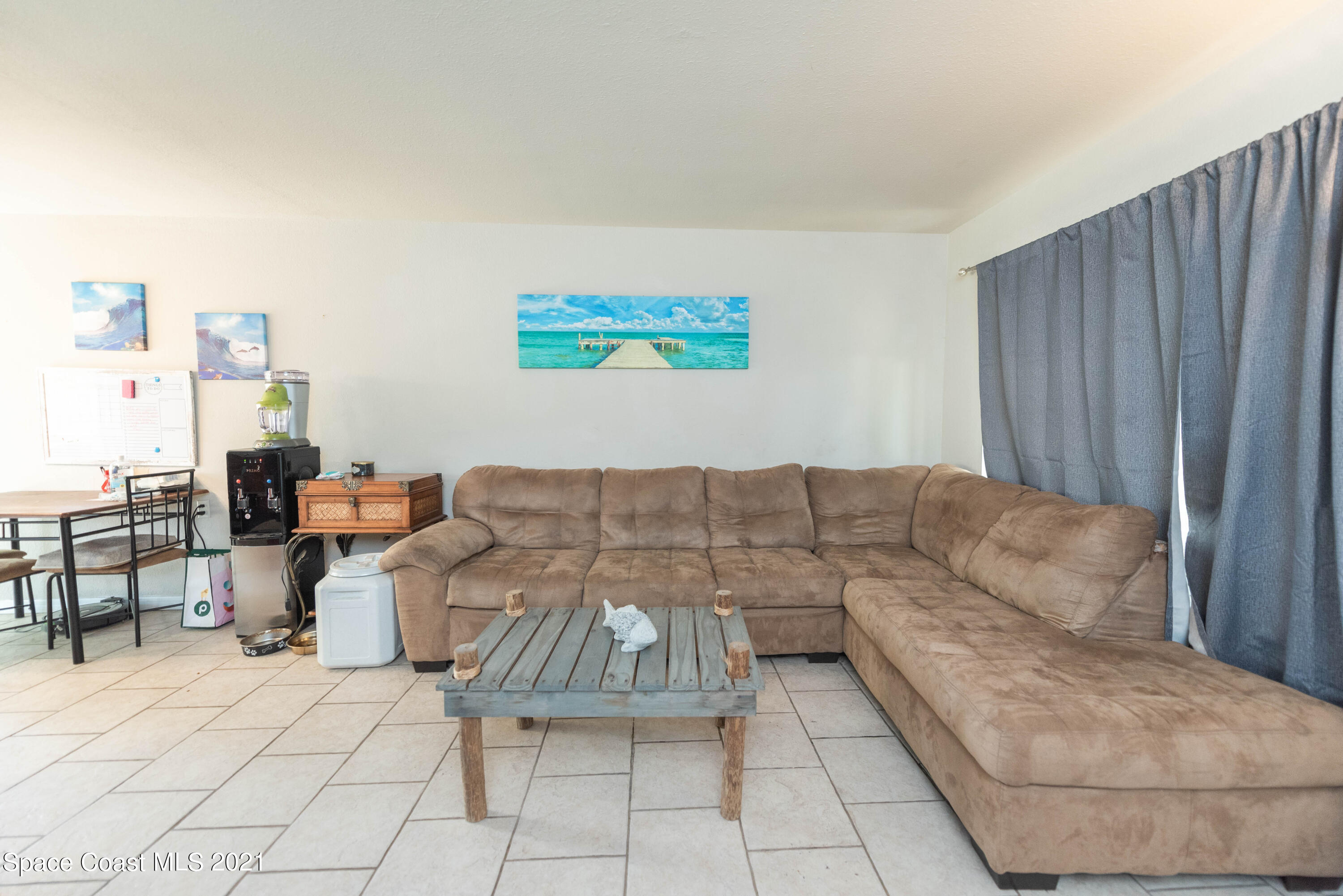 237 Chase Road Cocoa, FL 32927 - Photo 7 of 20 a living room with furniture and a couch