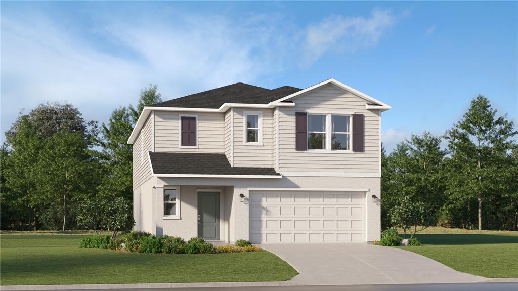 942 Hour Glass Road Lakeland, FL 33801 - Photo 1 of 1 a front view of a house with a yard and garage