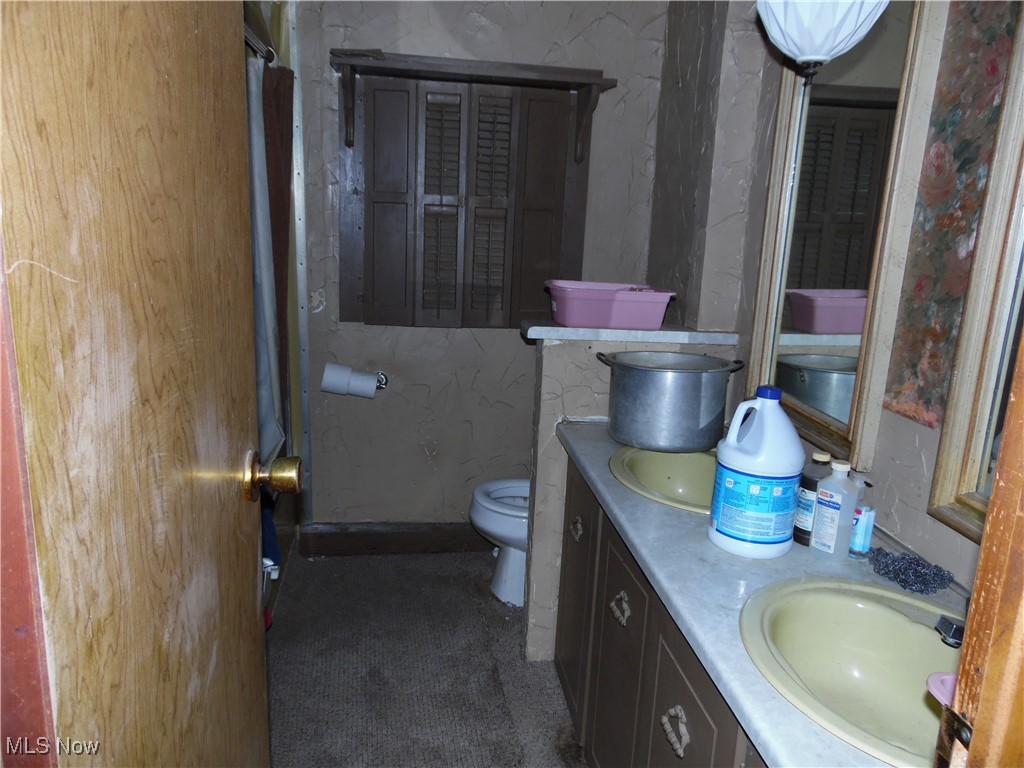19559 Salt Run Road Caldwell, OH 43724 - Photo 8 of 8 Bathroom featuring vanity and toilet