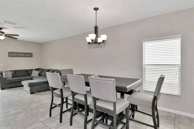 a bedroom with a bed and a desk