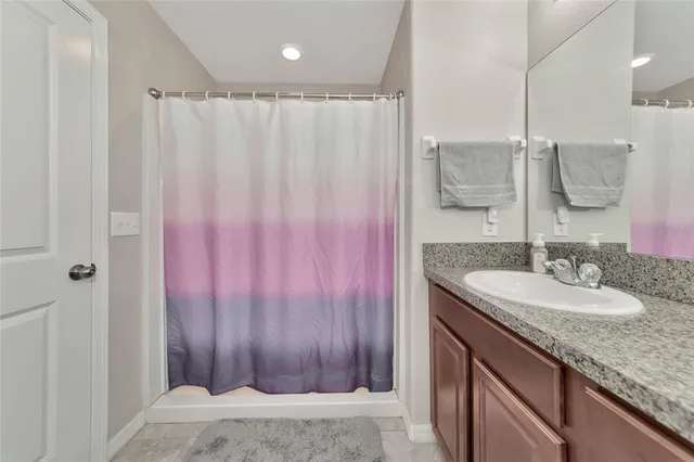 a view of an house with backyard and kitchen