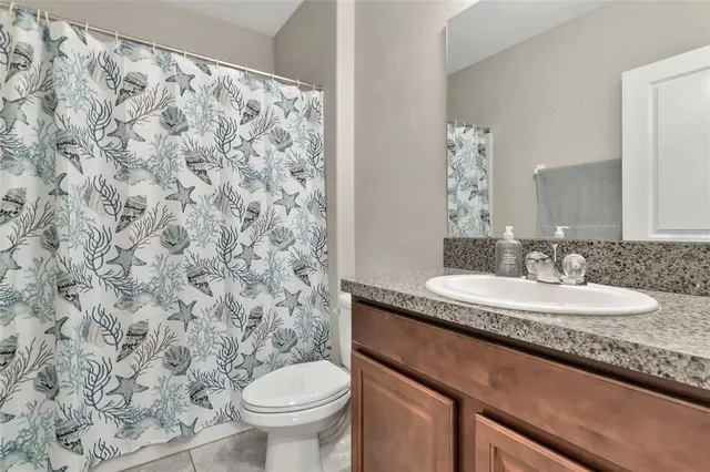 a view of a swimming pool and an outdoor seating