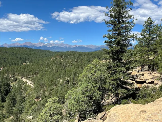 a view of a yard with an outdoor space and seating