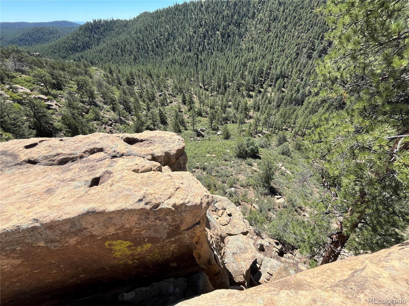 14200 County Road Weston, CO 81091 - Photo 26 of 42 a view of a backyard of a house