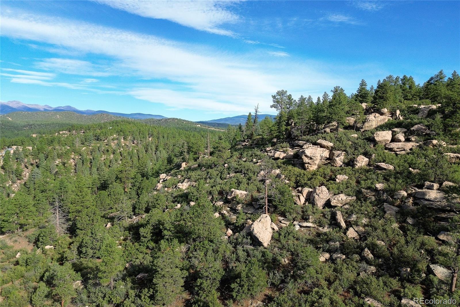 14200 County Road Weston, CO 81091 - Photo 38 of 42 a view of a city with lush green forest