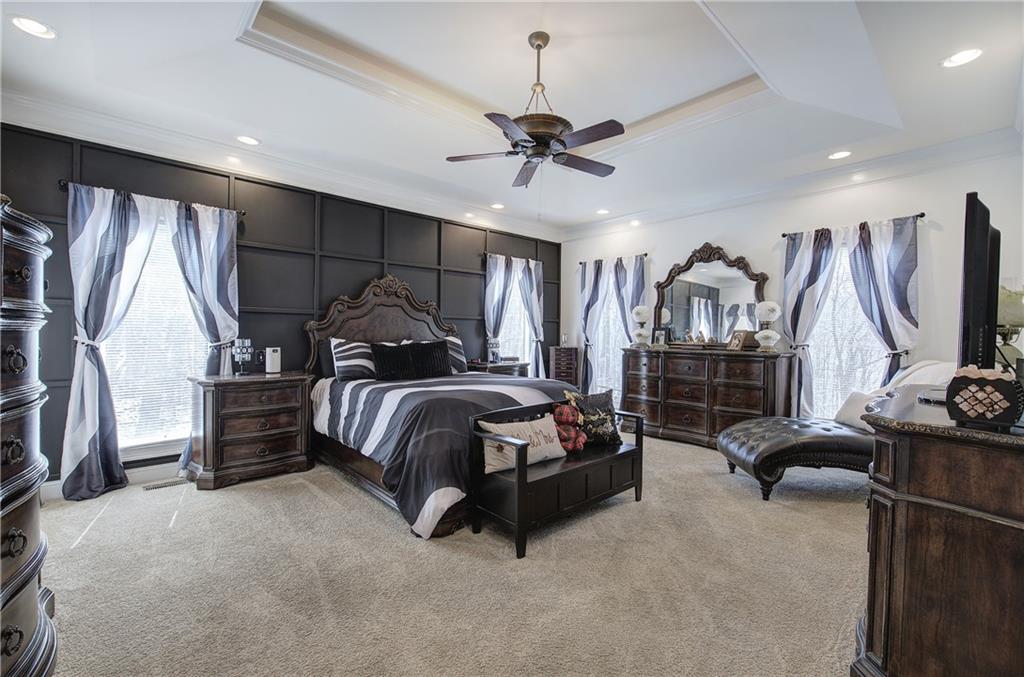 64 Fairview Court Jasper, GA 30143 - Photo 30 of 86 a bedroom with furniture and a flat screen tv